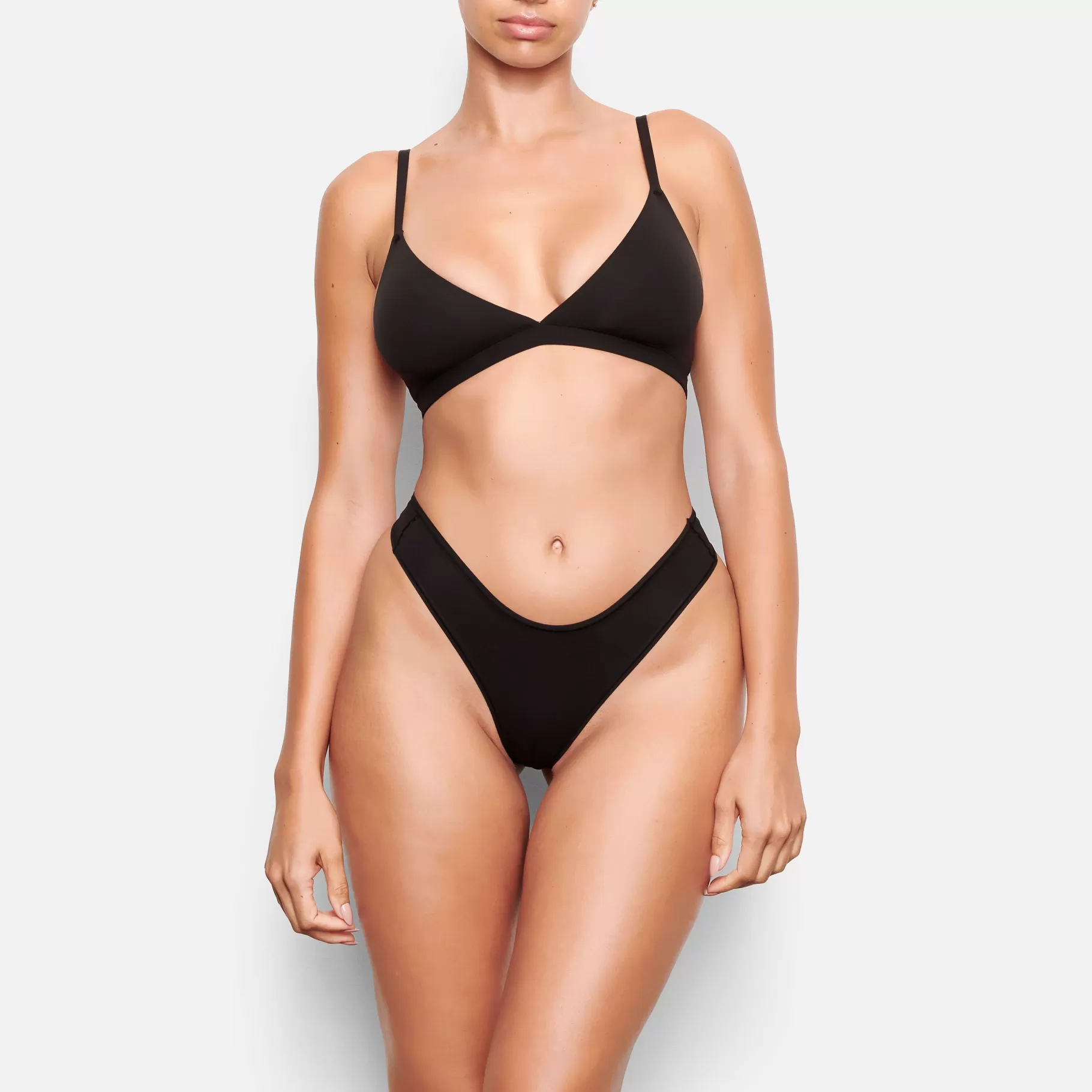 Skims for you*FITS EVERYBODY DIPPED FRONT THONG | ONYX