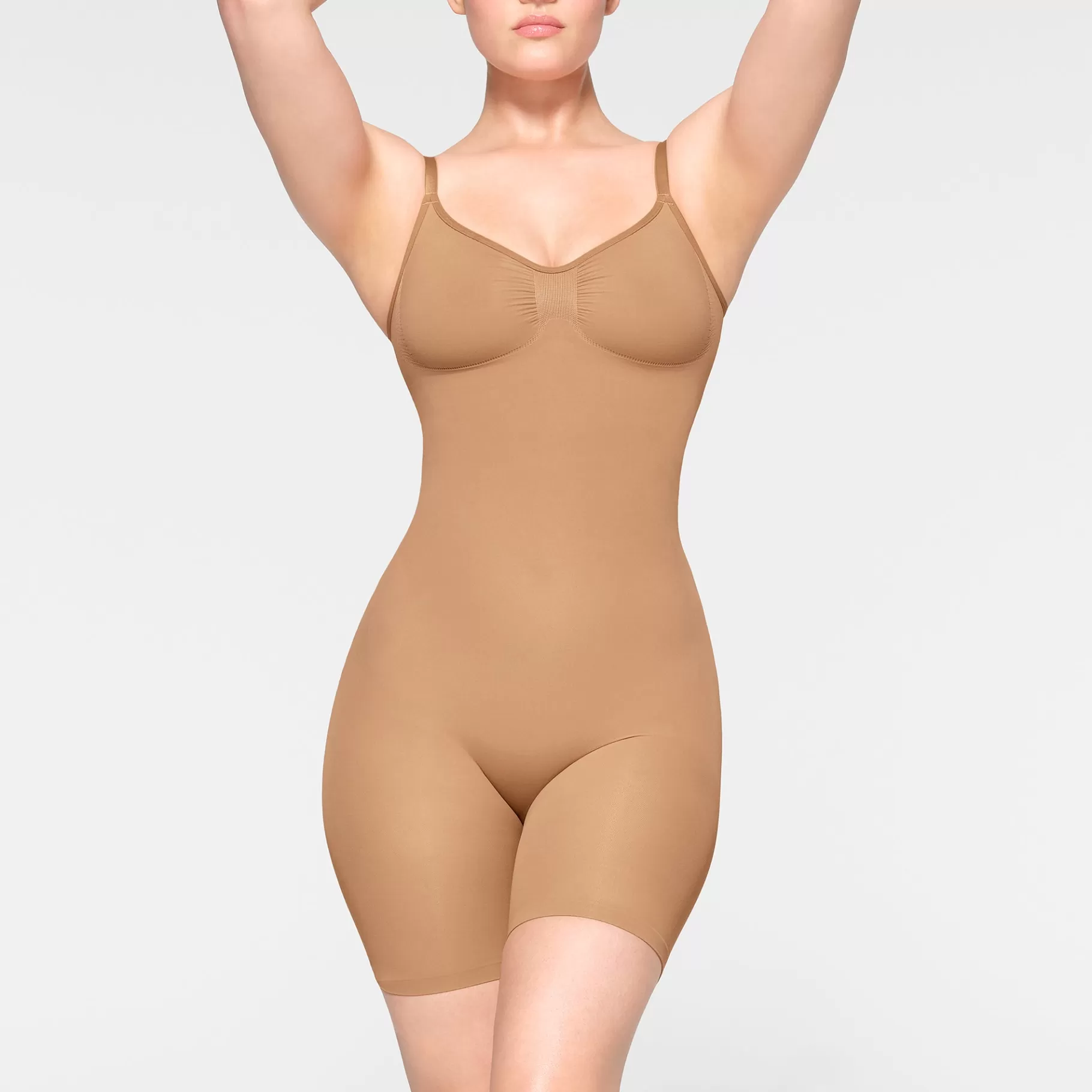 Skims seamless sculpt*SEAMLESS SCULPT MID THIGH BODYSUIT | OCHRE