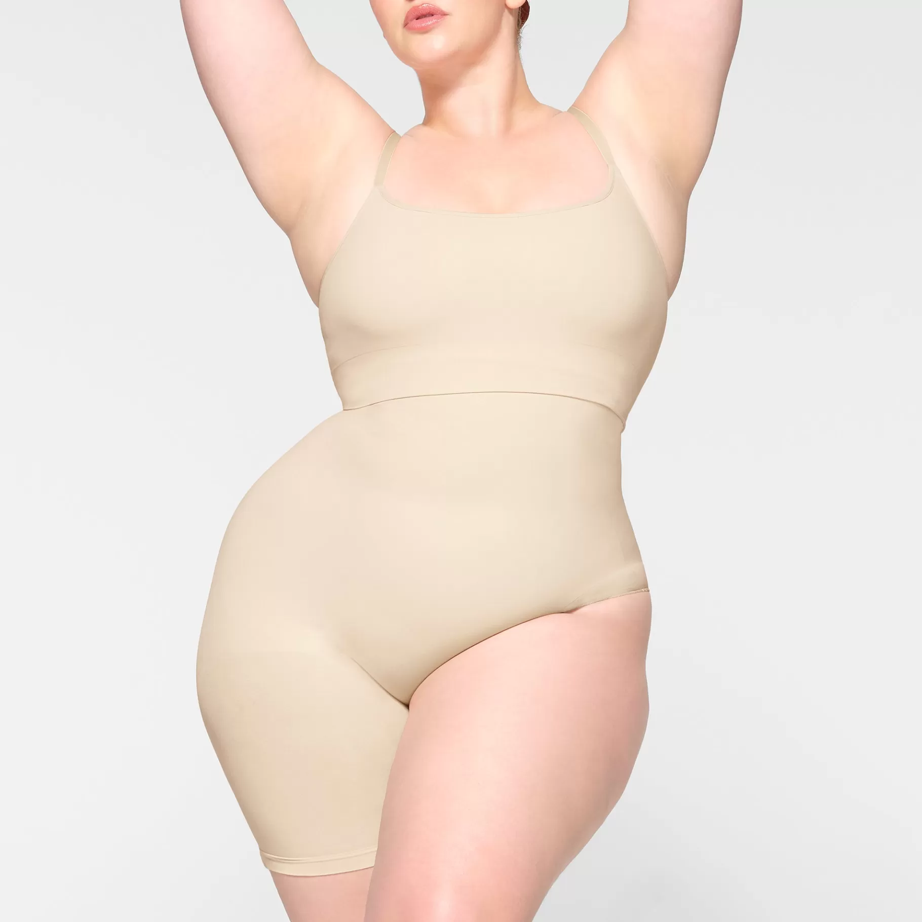 Skims shapewear shorts & leggings*SEAMLESS SCULPT SOLUTION SHORT LEFT LEG EXPOSED | SAND