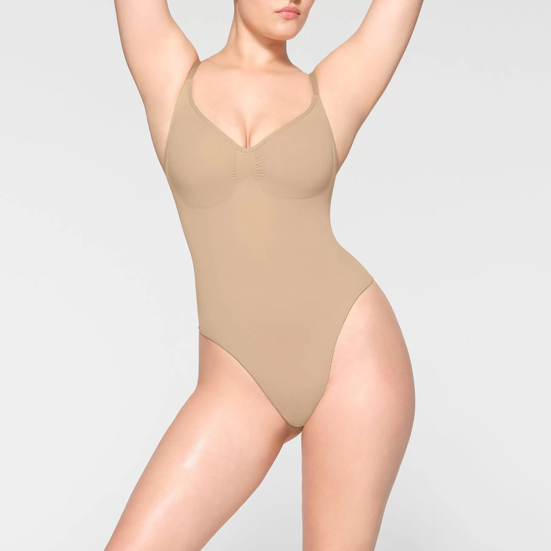 Skims seamless sculpt*SEAMLESS SCULPT THONG BODYSUIT | CLAY