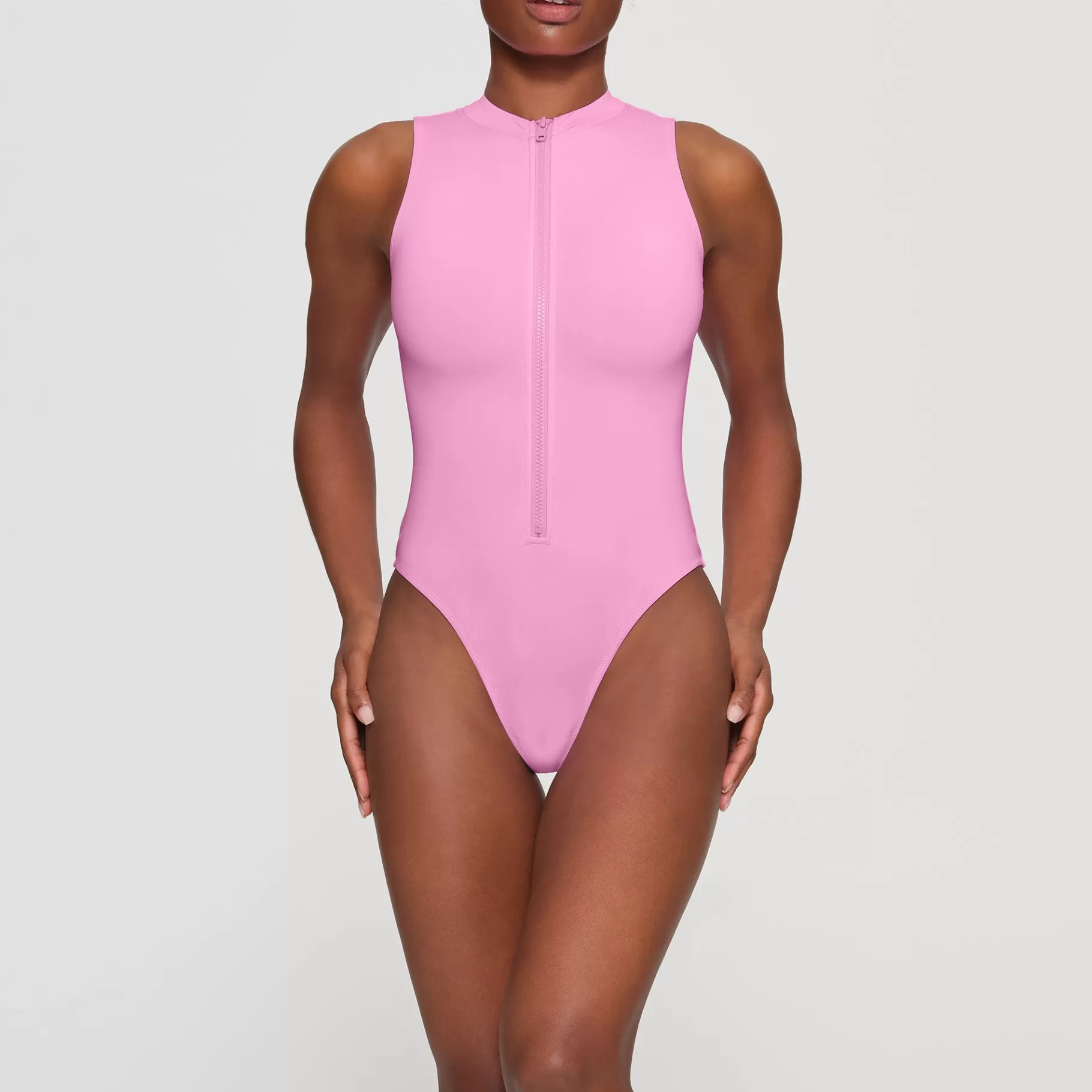 Skims swim*SIGNATURE SWIM ZIP FRONT SLEEVELESS ONE PIECE | LIGHT PINK LIGHT+PINK